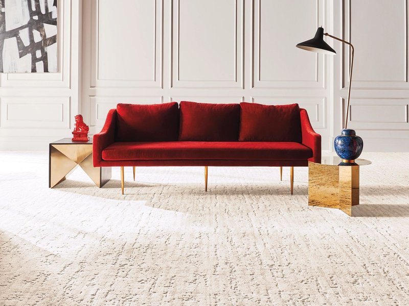 red couch on white nylon carpet from Goodrich Floor Coverings Inc in Salt Lake City