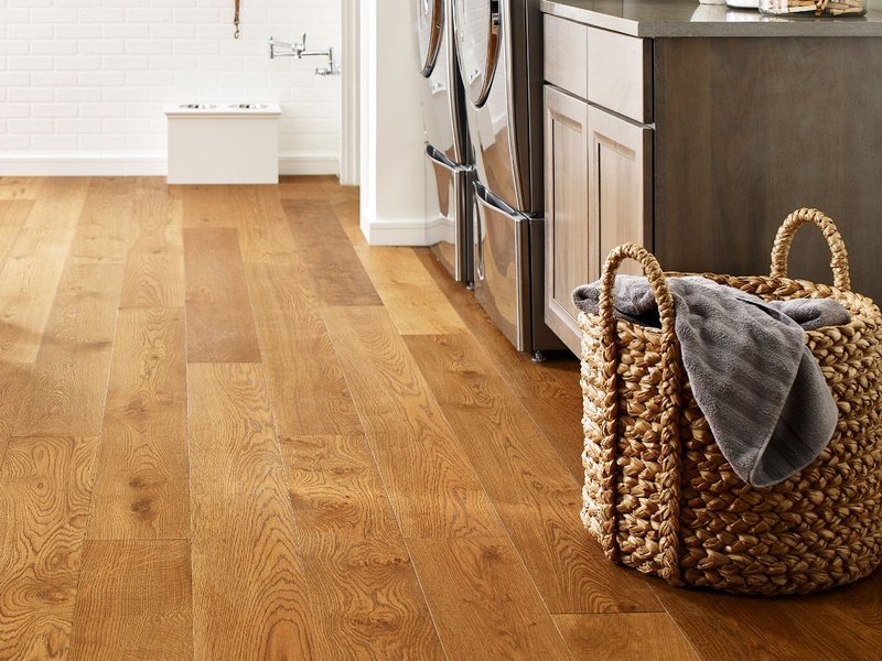 Basket laundry on a brown hardwood from Goodrich Floor Coverings Inc in Salt Lake City