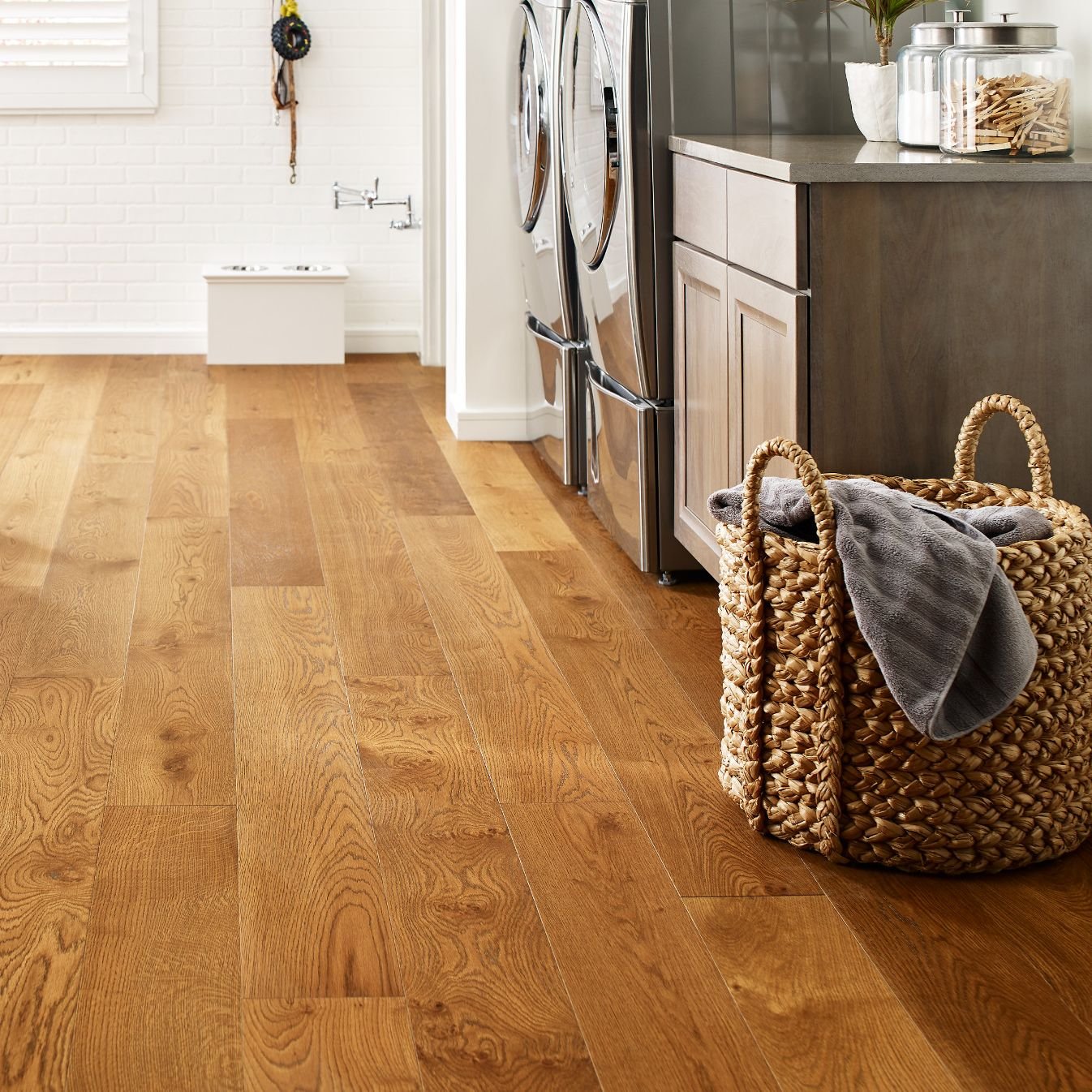 Basket laundry on a brown hardwood from Goodrich Floor Coverings Inc in Salt Lake City